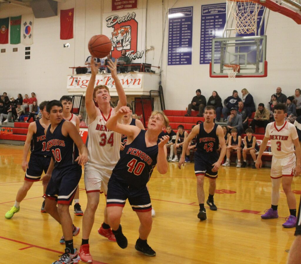 Dexter holds off Penquis on 2023 24 opening night Piscataquis